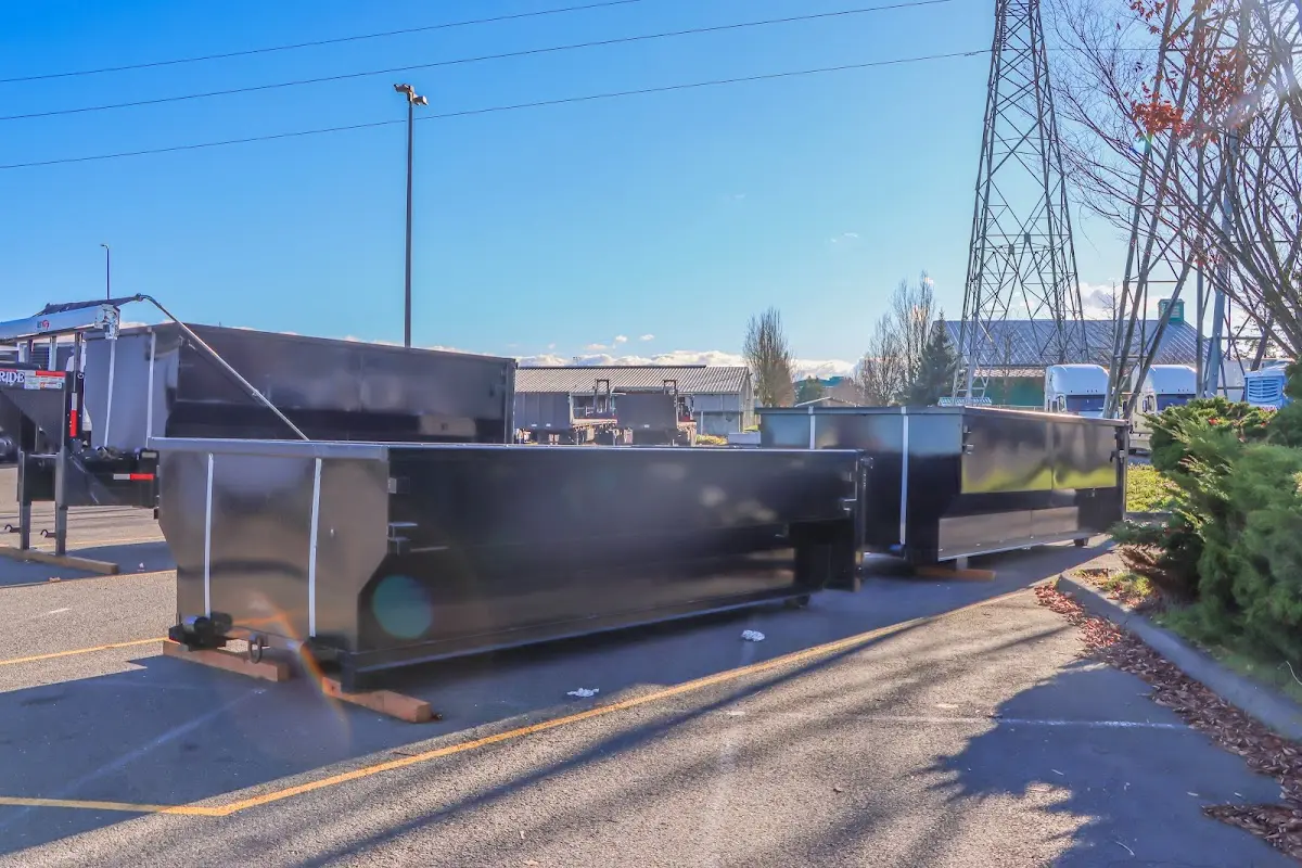 Roll-off dumpster ready for waste disposal at job site for 2 Yard Dumpster Rental in Kenmore